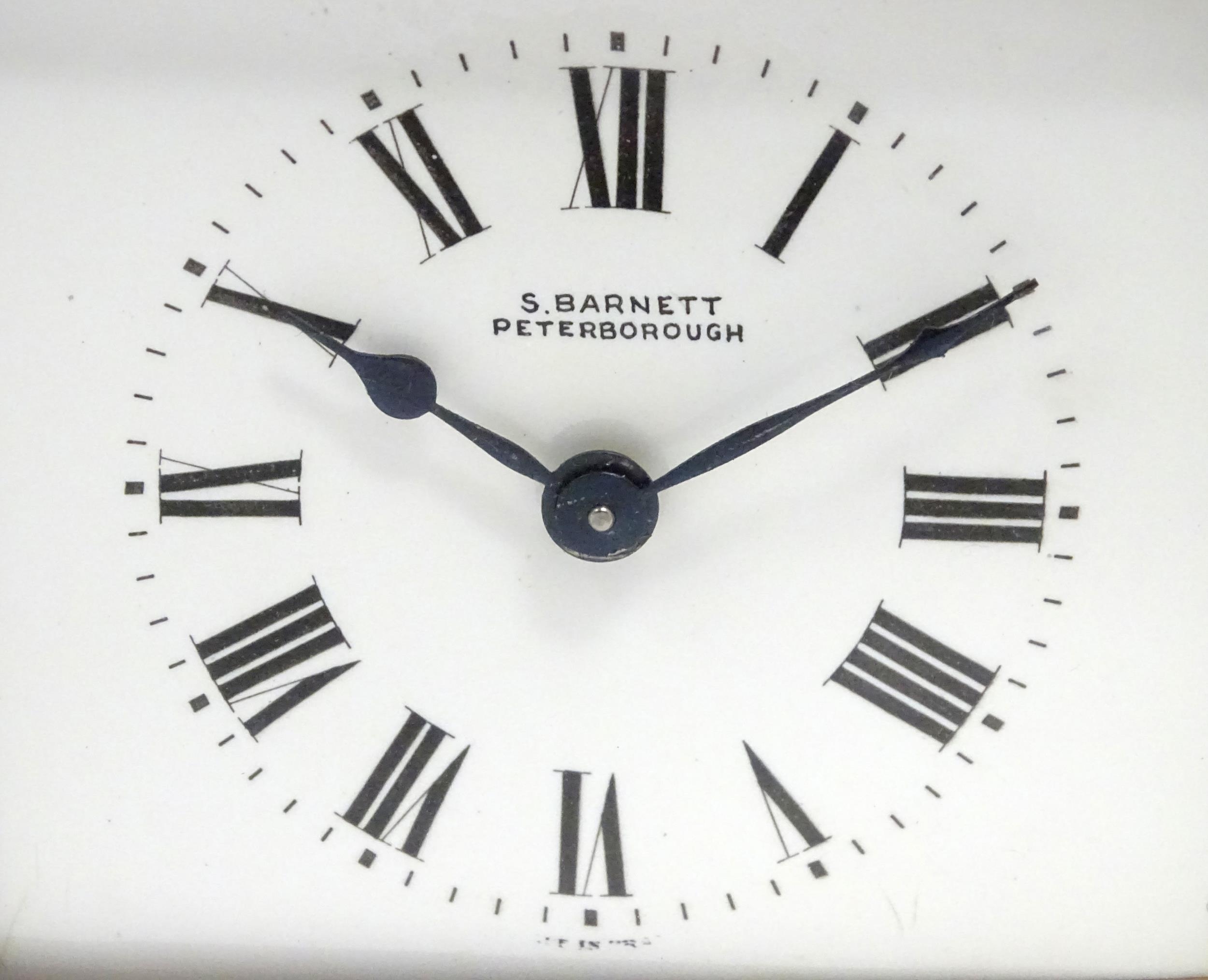 A French brass cased carriage clock with white enamel dial signed ' S Barnett Peterborough ' the - Image 6 of 9