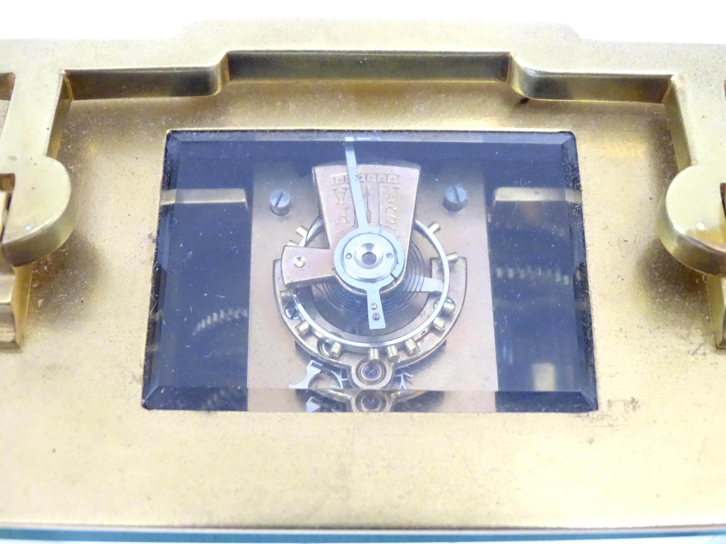 A French brass cased carriage clock with white enamel dial signed ' S Barnett Peterborough ' the - Image 5 of 9