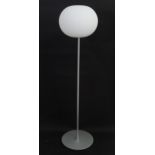 A Flos Glo-Ball standard / floor lamp with glass shade, designed by Jasper Morrison. Approx. 53"