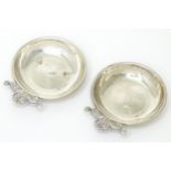A pair of Continental .925 silver pin dishes with scroll formed handles. Approx. 2 3/4" wide (2)