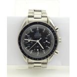 Watch : An Omega Speedmaster Reduced chronograph bracelet watch. The Stainless steel case with