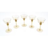 A set of five Salviati Venetian Renaissance Revival glass champagne coupes, the octagonal bowls with