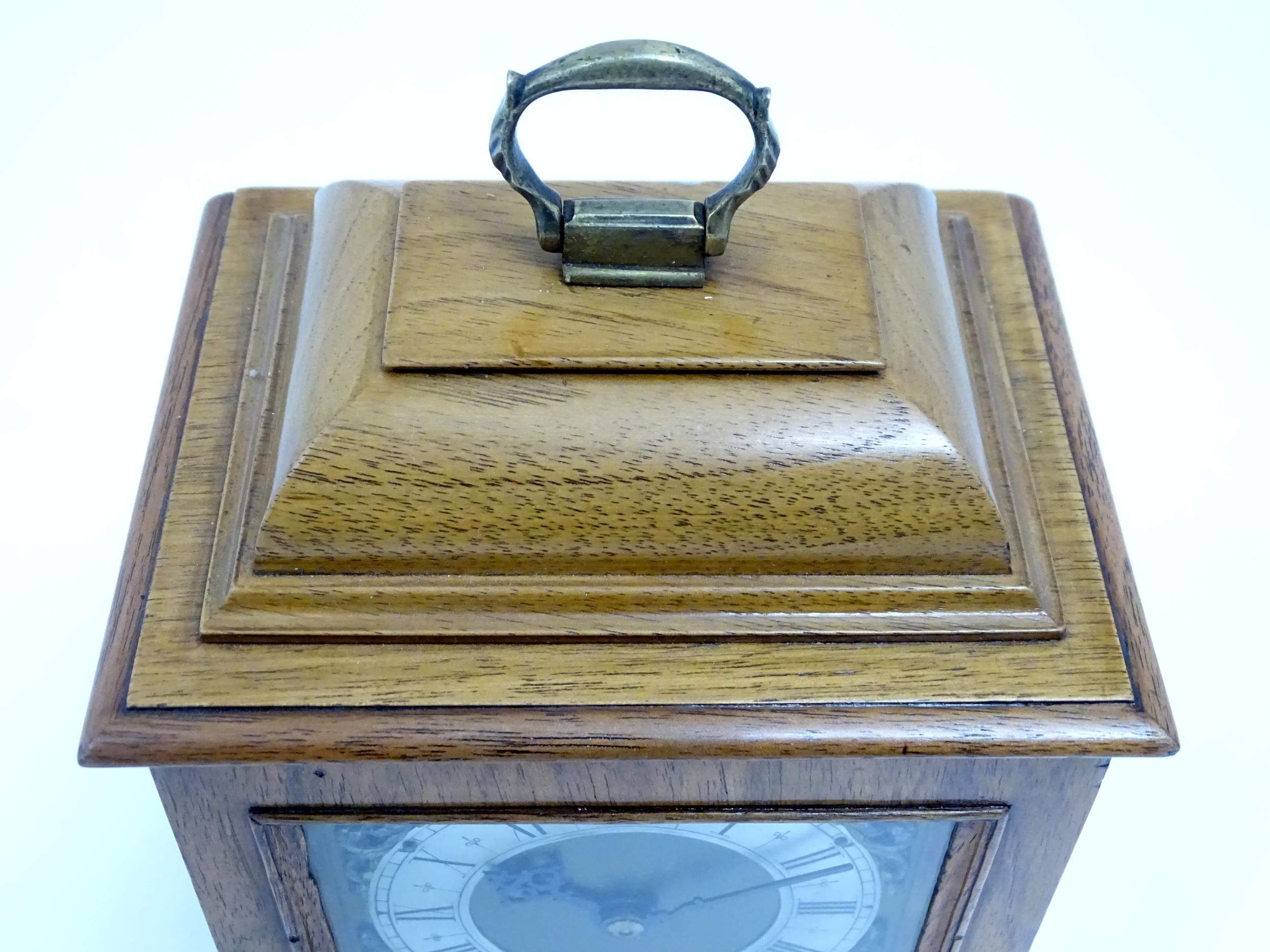 A 20thC walnut cased mantle clock with brass dial and silvered chapter ring with Roman numerals. - Image 7 of 9