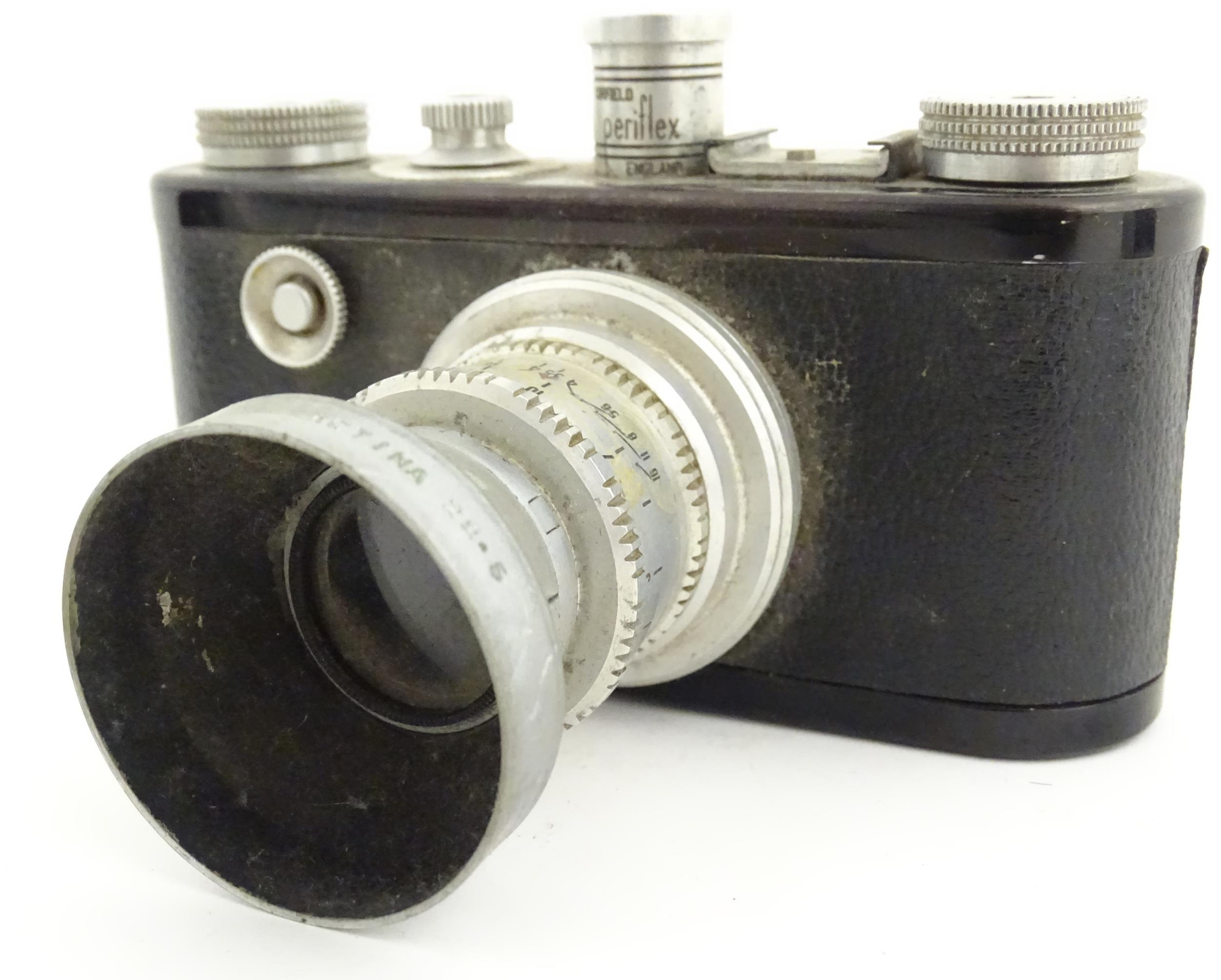 A quantity of 20thC cased cameras to include a Zeiss Ikon Nettar 517/16 camera, a Corfield - Image 20 of 24