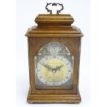 A 20thC walnut and burr walnut 'Elliot clock', the brass dial signed Alexander Clark Co Ltd and with