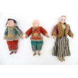 Toys: Two Chinese dolls with papier mache heads and hands, wearing embroidered Chinese clothing.