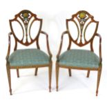 A pair of 19thC satinwood open arm chairs with hand painted frames, having Hepplewhite style