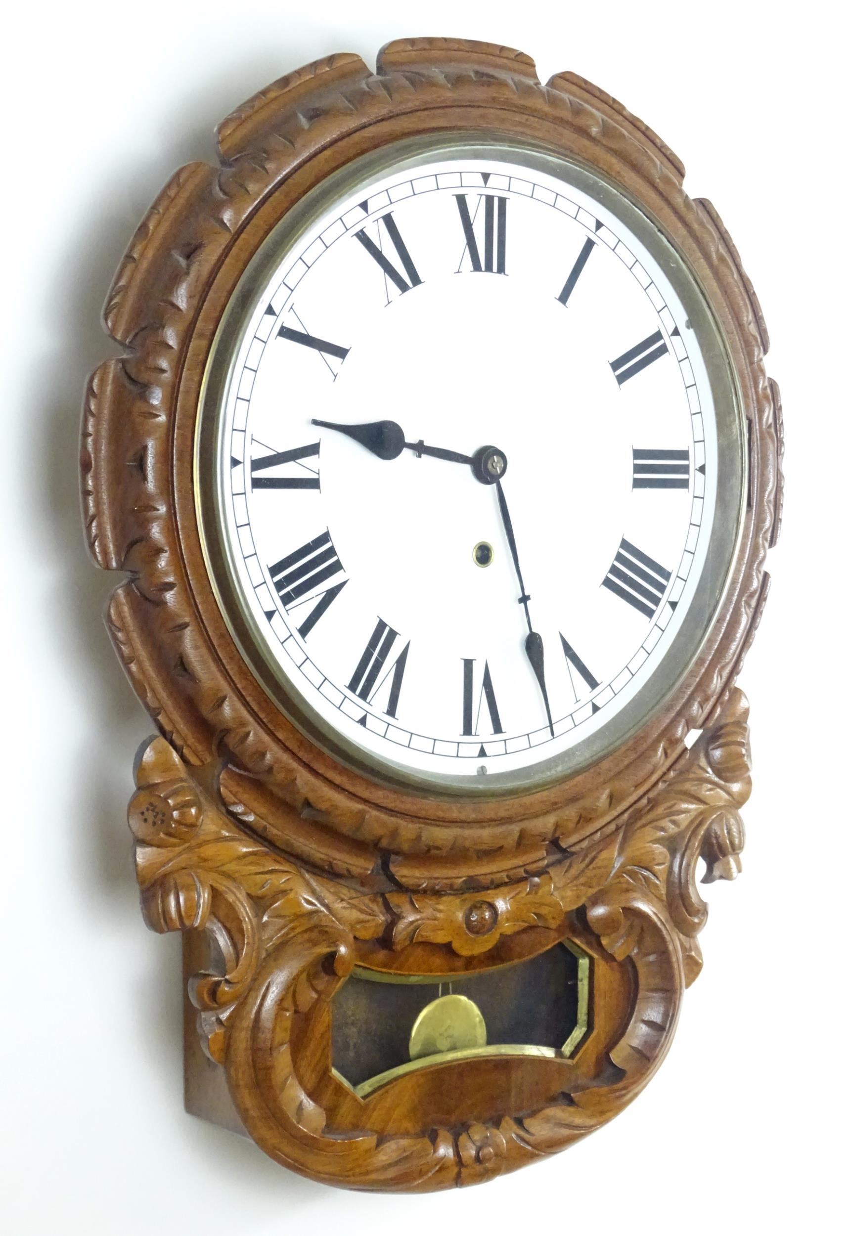 A 20thC drop dial wall clock. Dial approx 12" diameter. Approx. 22 1/2" long overall Please Note - - Image 7 of 9
