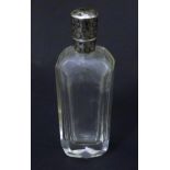 A glass scent / perfume bottle with Dutch silver top. Approx 3 1/2" Please Note - we do not make