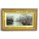 K. Jackson, Early 20th century, Oil on canvas, A wooded river landscape with two swans. Signed and