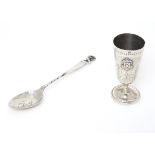A French silver pedestal cup with armorial and engine turned decoration. Together with a silver