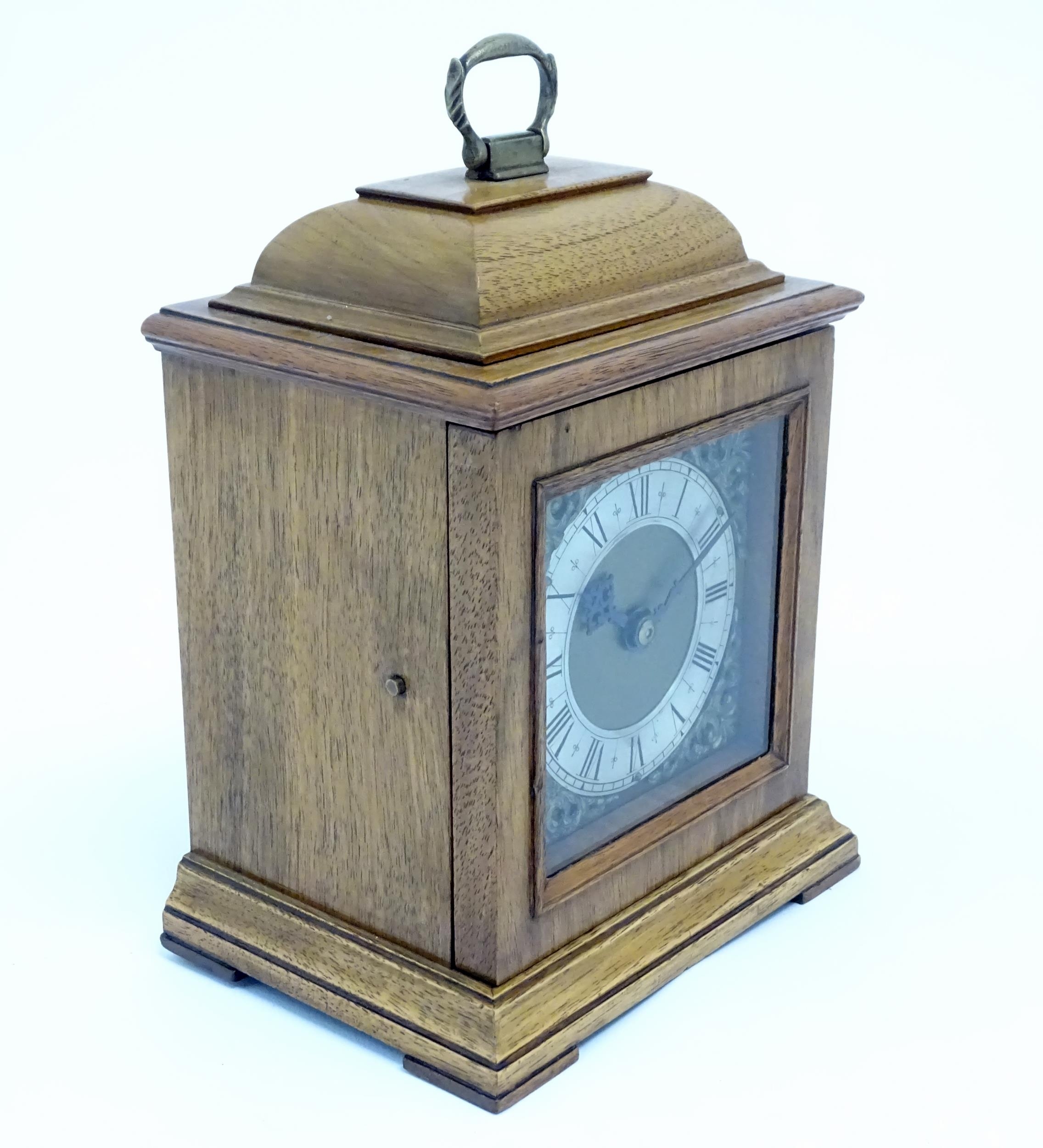 A 20thC walnut cased mantle clock with brass dial and silvered chapter ring with Roman numerals. - Image 3 of 9