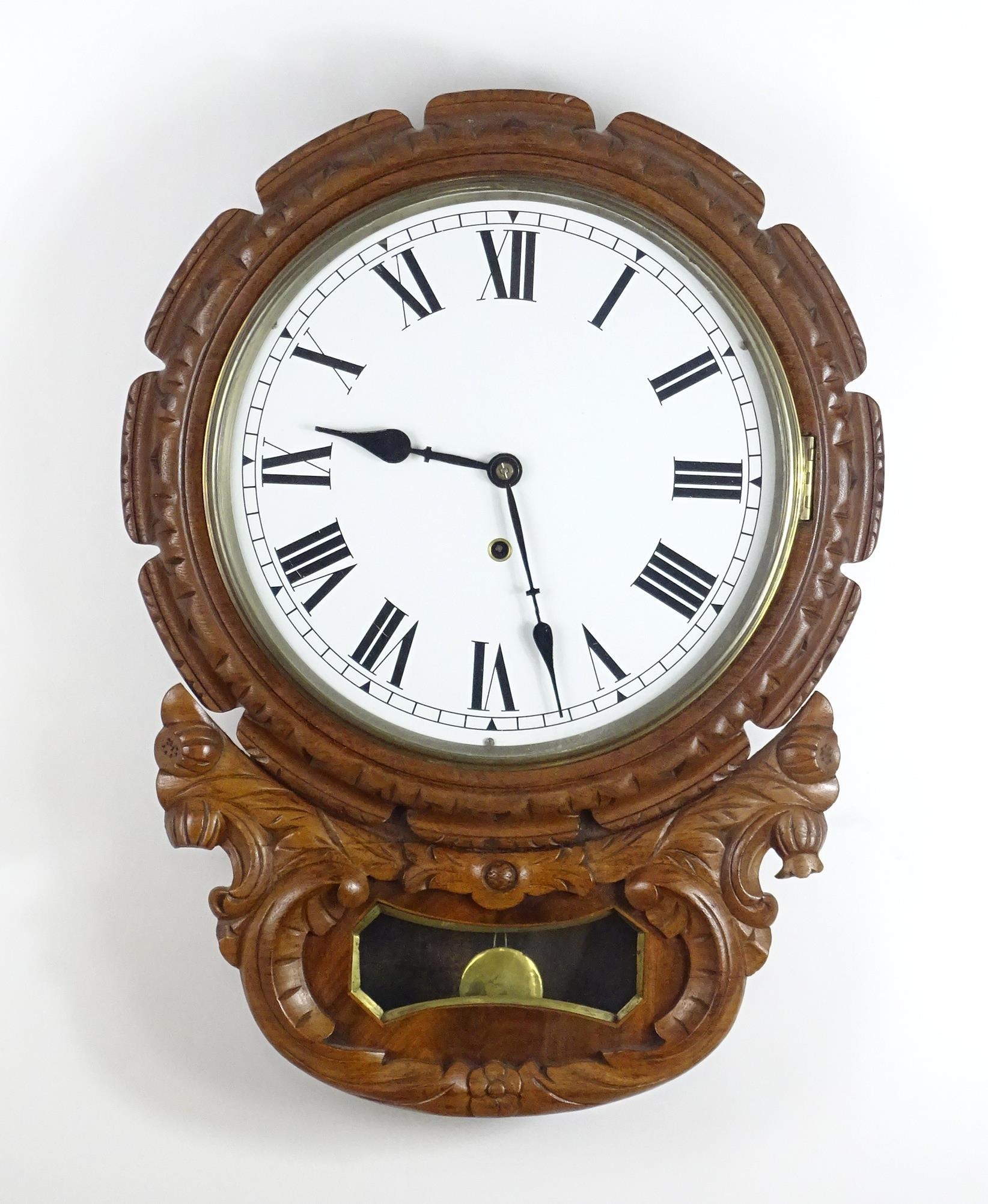 A 20thC drop dial wall clock. Dial approx 12" diameter. Approx. 22 1/2" long overall Please Note -
