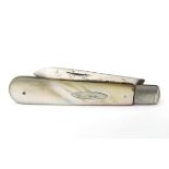 A silver folding fruit knife with mother of pearl handle, hallmarked Sheffield 1927, maker Edmund