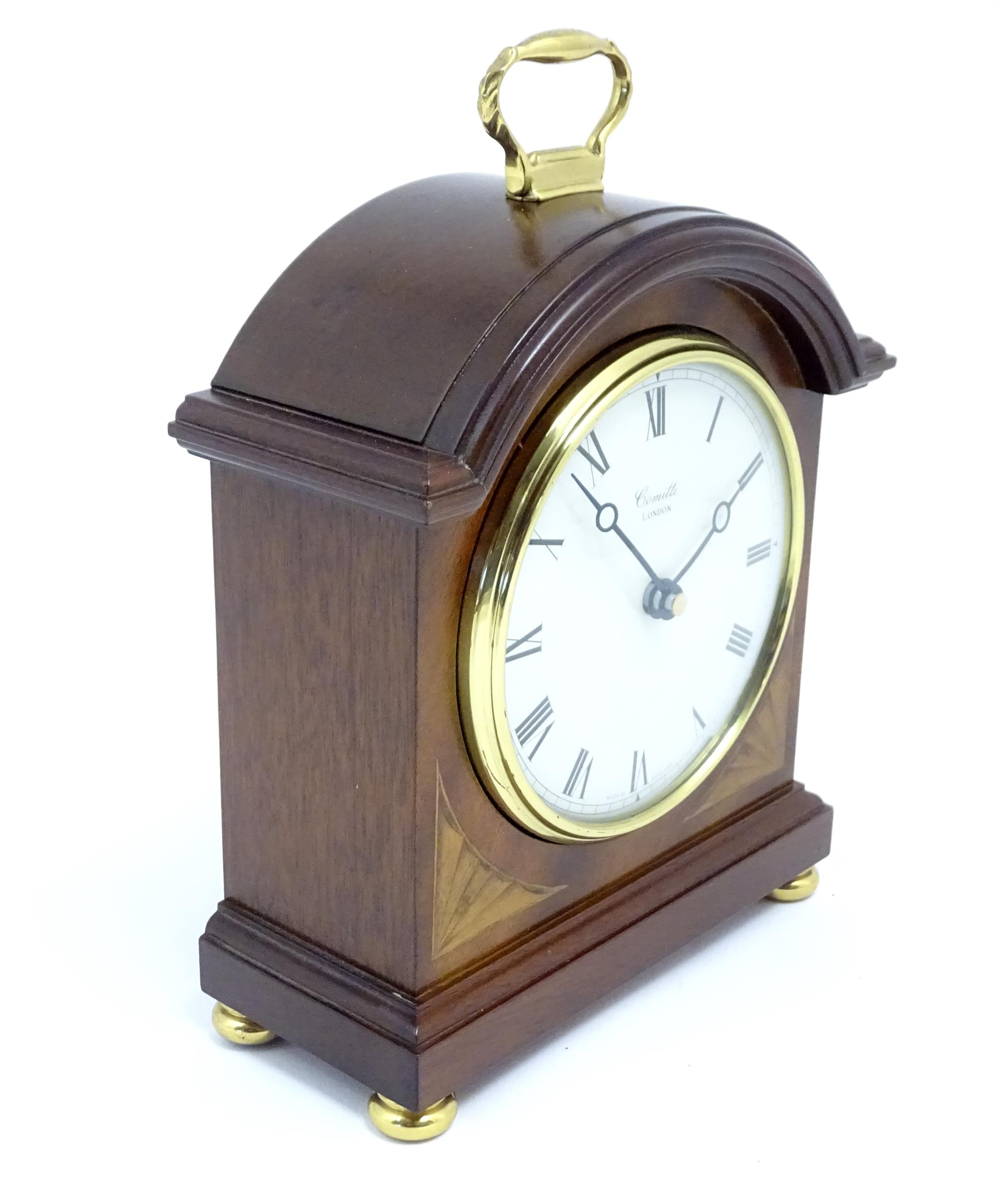 A Comitti battery powered mantel clock. Approx 8 1/2" high Please Note - we do not make reference to - Image 3 of 6