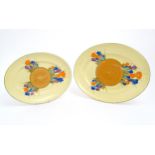 Two Clarice Cliff oval serving plates decorated in the Crocus pattern. Marked under. Largest approx.