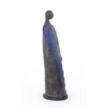 A studio pottery model of a woman in a blue dress. In the manner of Elizabeth Rollins Scott. Incised