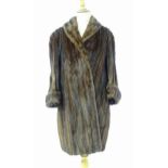 Vintage fashion / clothing: A vintage, mid length fur coat, bust measures 42" approx. Please