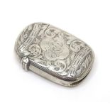 A Victorian silver vesta case with engraved foliate decoration, hallmarked Birmingham 1891, maker