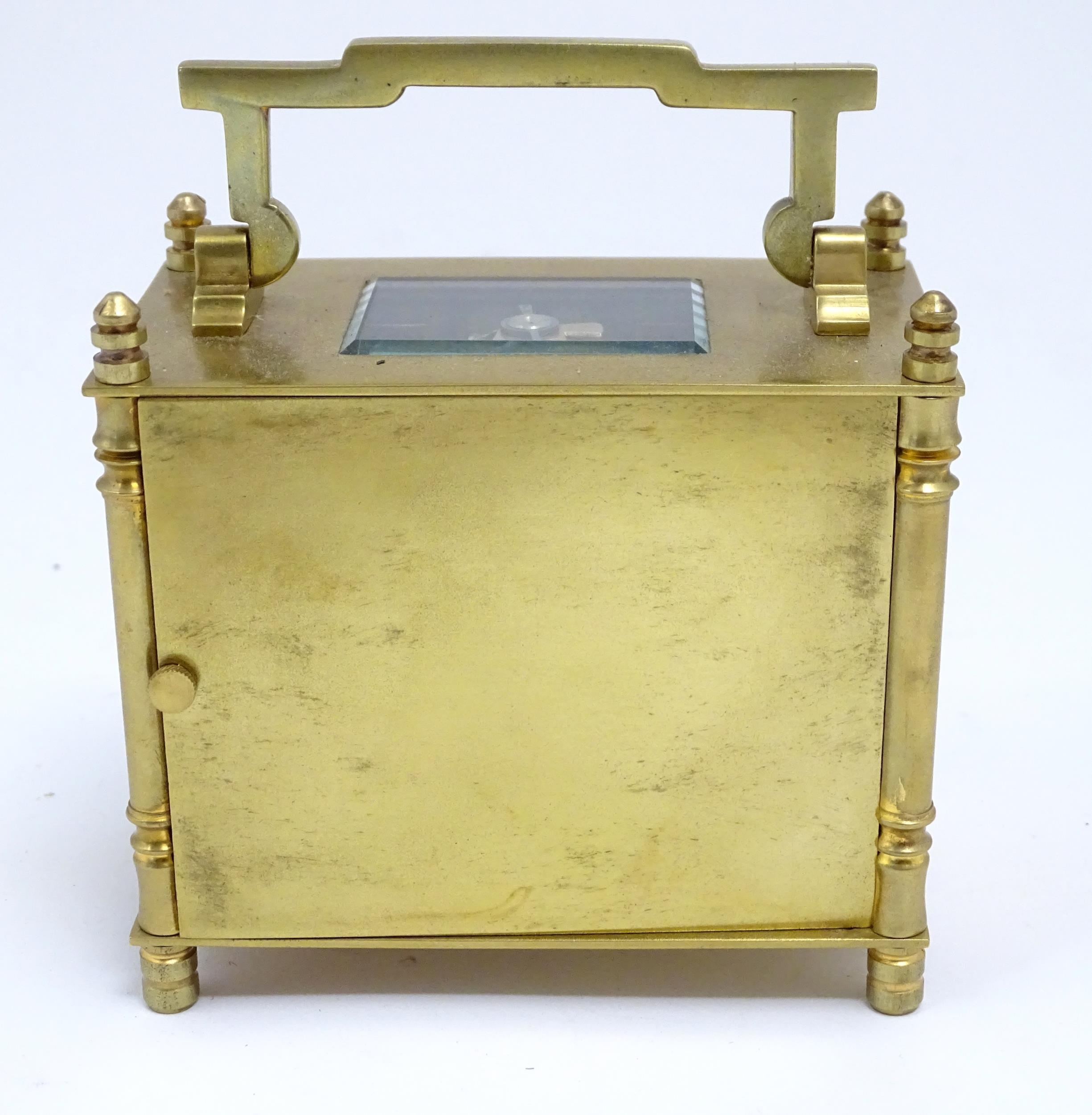A French brass cased carriage clock with white enamel dial signed ' S Barnett Peterborough ' the - Image 8 of 9