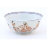 A Chinese bowl decorated with figures and animals to include fish, buffalo, crane, etc. The interior