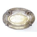 A silver bon bon dish of oval form with pierced decoration, hallmarked Birmingham 1910, maker