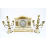A late 19thC / early 20thC French mantle clock garniture / garniture de cheminee. The white marble