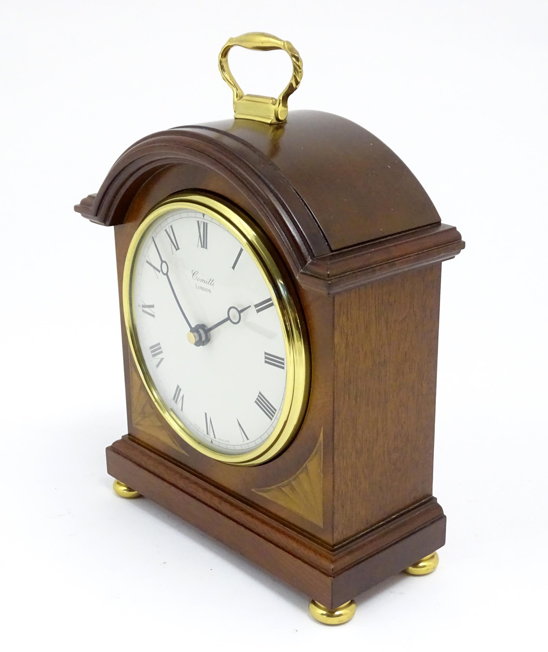 A Comitti battery powered mantel clock. Approx 8 1/2" high Please Note - we do not make reference to - Image 4 of 6