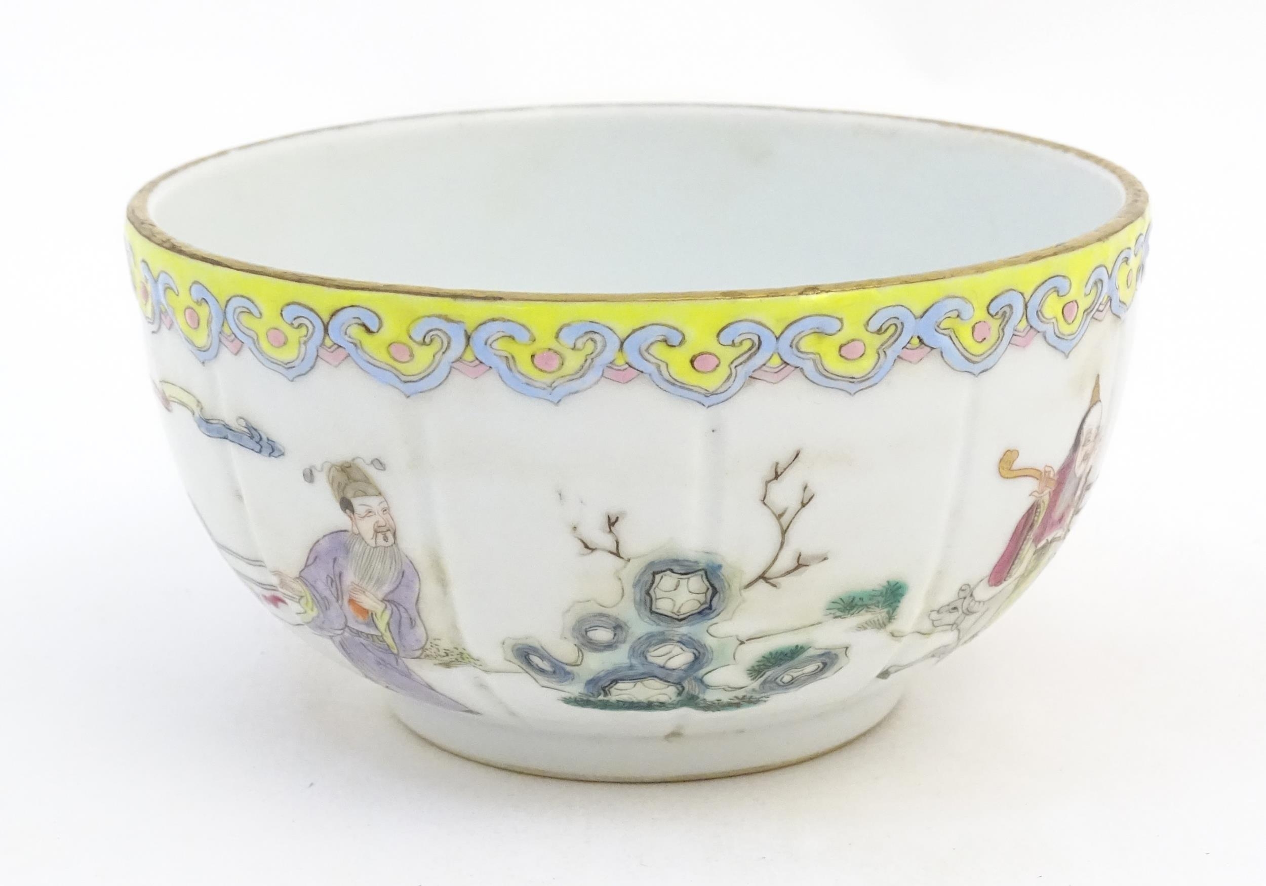 A Chinese famille rose bowl decorated with figures in a stylised landscape. Approx. 3" high x 5" - Image 3 of 7