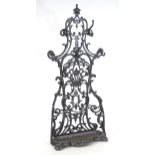 A Coalbrookdale style stick stand / coat rack of large proportions with a cast iron frame, seven