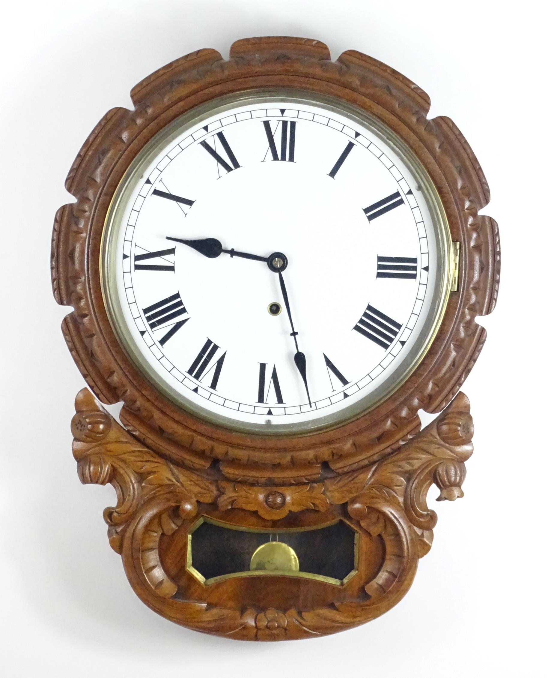 A 20thC drop dial wall clock. Dial approx 12" diameter. Approx. 22 1/2" long overall Please Note - - Image 5 of 9