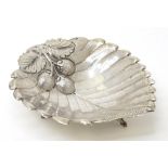 A Continental silver dish of leaf form with strawberry detail. Marked .830. Approx. 4 3/4" long