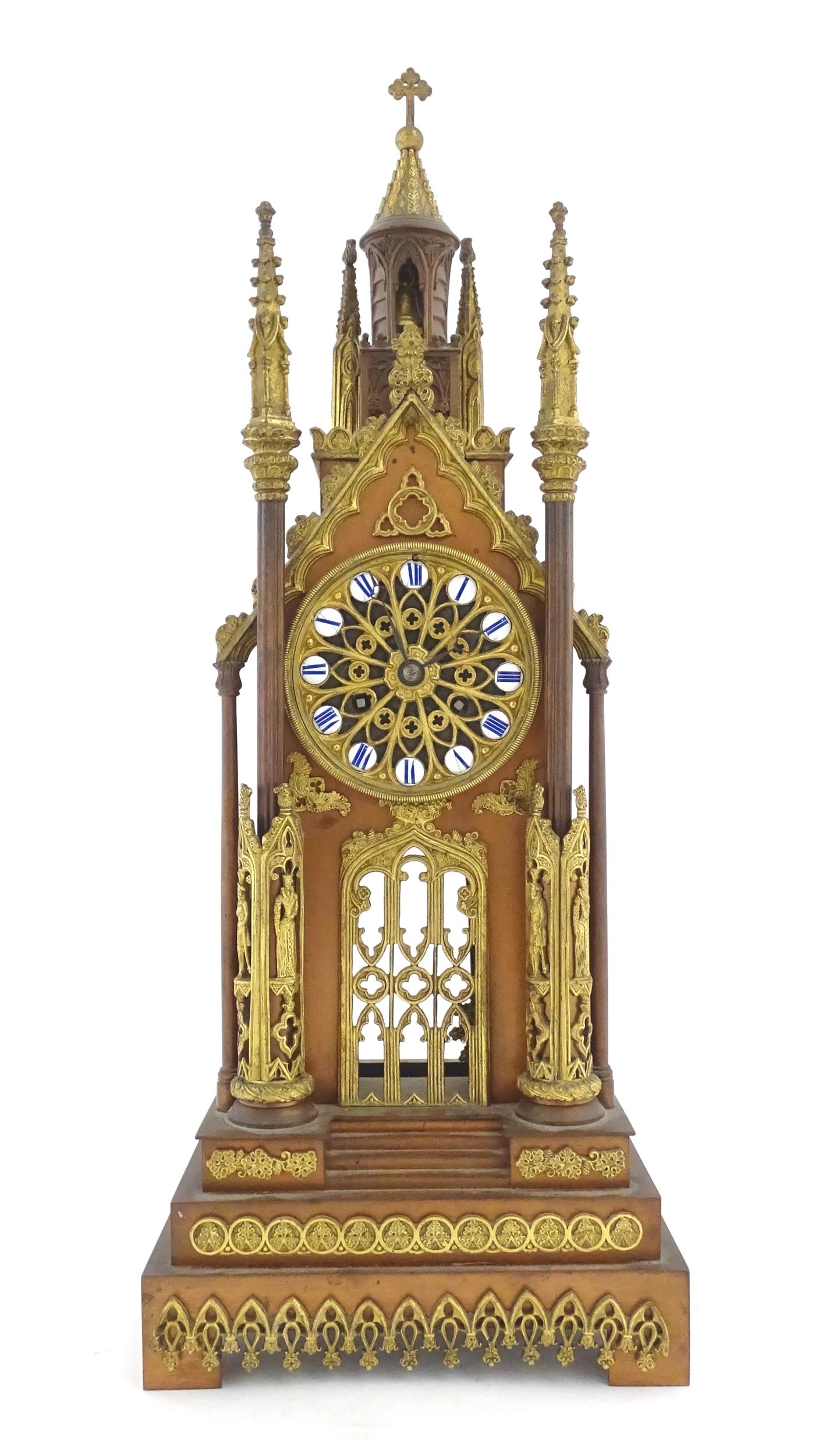 A French cathedral clock of gothic architectural design with ormolu mounts, having pointed finials