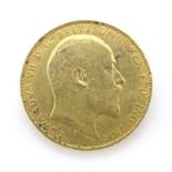 Coin : A George VII 1909 gold sovereign coin. Total weight approx. 8g Please Note - we do not make