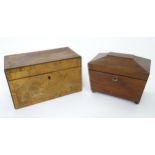 A 19thC walnut tea caddy with crossbanding, opening to reveal two hinge lidded sections within.