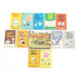 Books: A quantity of Charlie Brown / Snoopy books by Charles M. Schulz, published by Coronet, titles