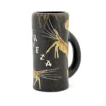 A Spanish studio pottery beer tankard with prawn decoration and titled Cerveza. Marked Nalda