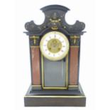 A black slate mantel clock with rouge marble and gilt highlights, the dial signed Leroy & Fils, 57