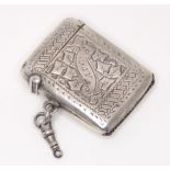 A silver vesta case with engraved foliate decoration, hallmarked Birmingham 1919, maker Frank Banks.