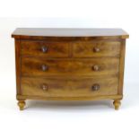 An early / mid 19thC mahogany chest of drawers comprising two short over two long drawers with