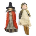 Toys: A 20thC German doll with a bisque head with blinking eyes, painted lips, wooden body and