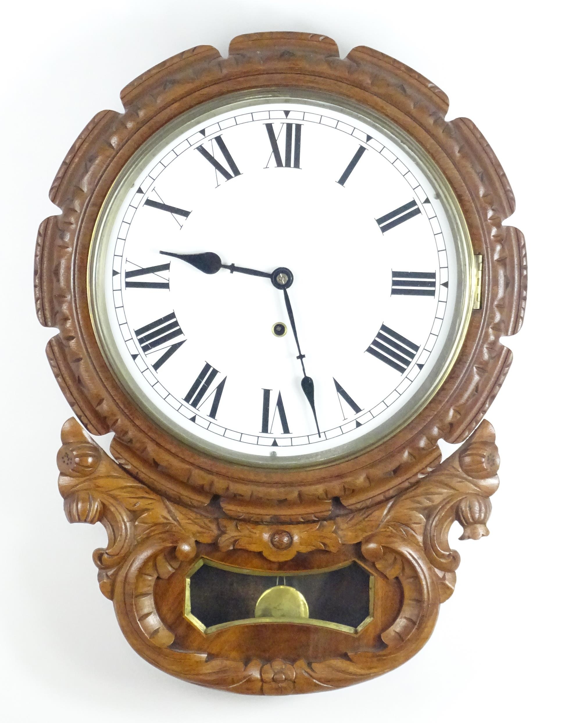 A 20thC drop dial wall clock. Dial approx 12" diameter. Approx. 22 1/2" long overall Please Note - - Image 3 of 9