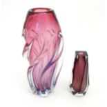 A bohemian Czechoslovakian art glass amethyst coloured vase in the manner of Josef Hospodka,