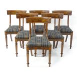 A set of six mid 19thC mahogany dining chairs, the chairs having curved and carved top rails with