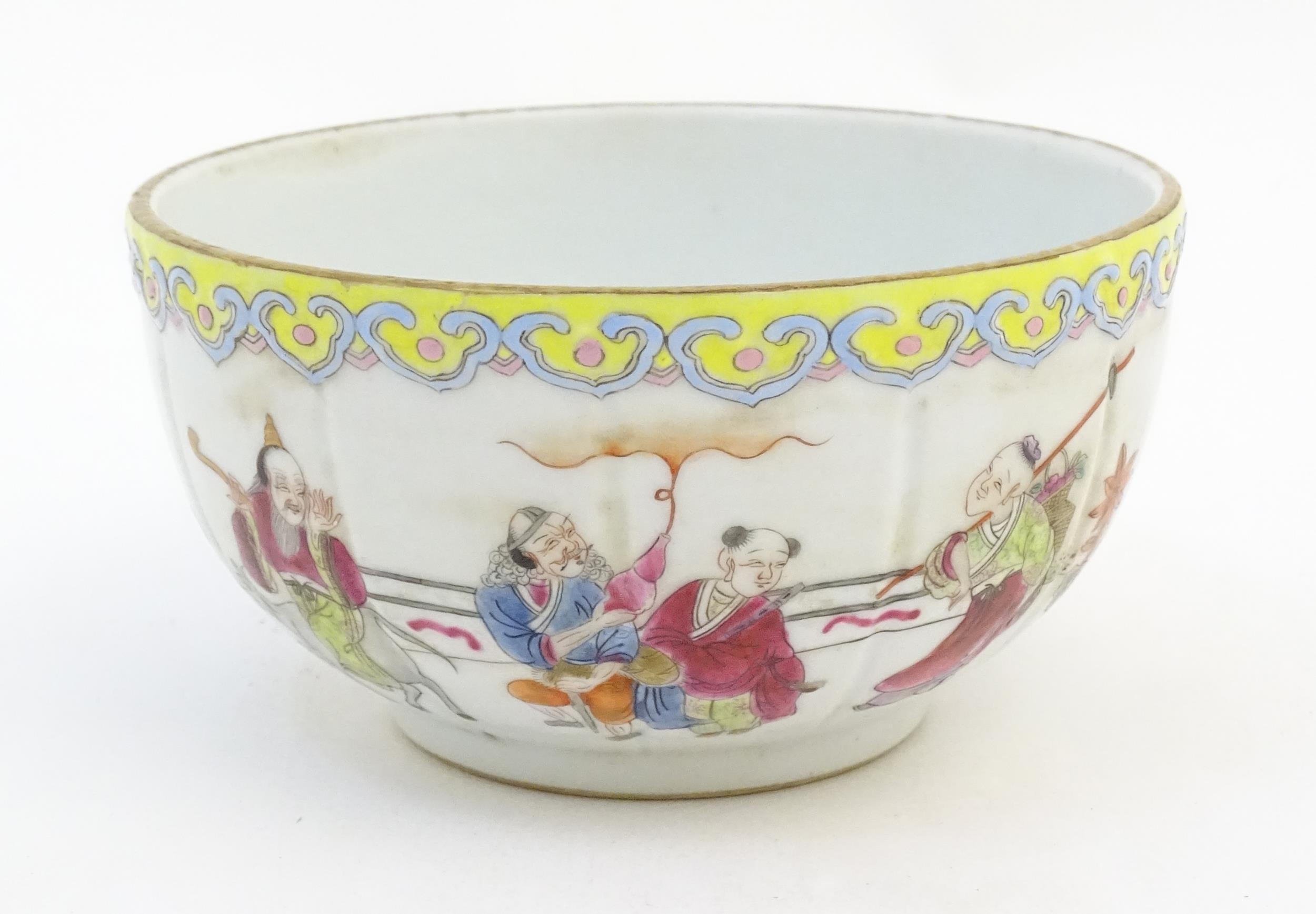 A Chinese famille rose bowl decorated with figures in a stylised landscape. Approx. 3" high x 5" - Image 4 of 7