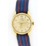 A Tissot Antimagnetique gentleman's wrist watch with 9ct gold case, having a signed dial with gilt