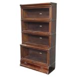 * Bookcase. A 1920s Globe Wernicke stained beech 4-tier bookcase