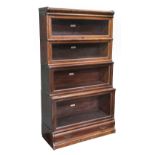 * Bookcase. A 1920s Globe Wernicke stained beech 4-tier bookcase