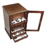 * Entomology. A mahogany specimen cabinet with butterflies, moths and beetles