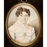 * English School. Portrait miniature of a young lady, circa 1800